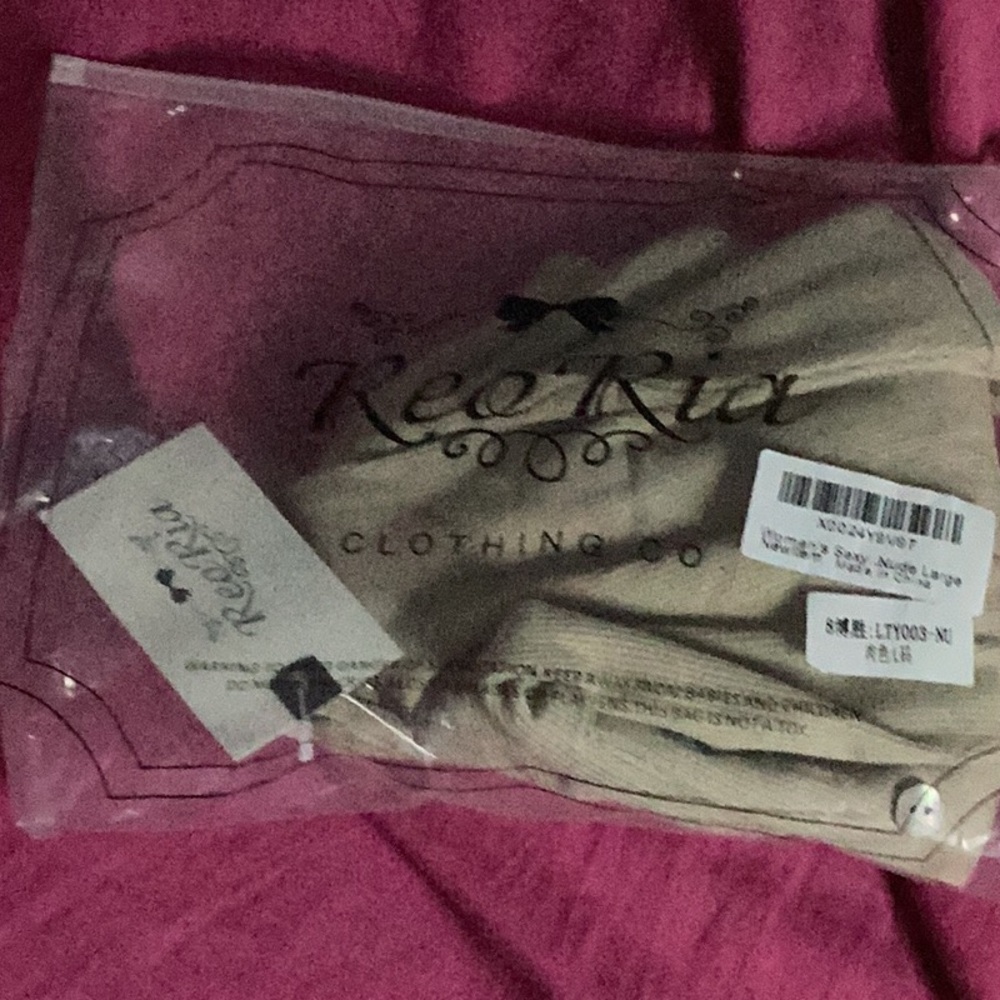 Rio Ria bodysuit creamish tan